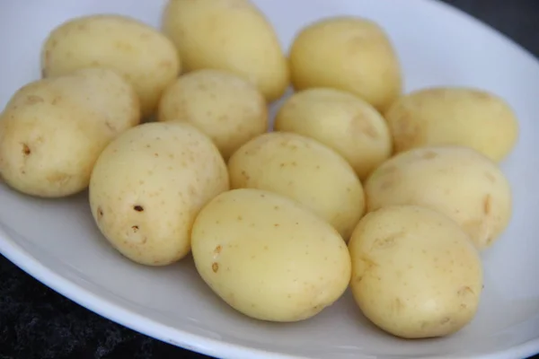 Homemade Small New Potatoes White Plate Side View Close Angle — Stock Photo, Image