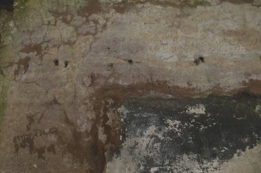 İğrenç gri kahverengi duvar arka plan dokusu. Terk edilmiş, depresif, kıyamet sonrası atmosferi.