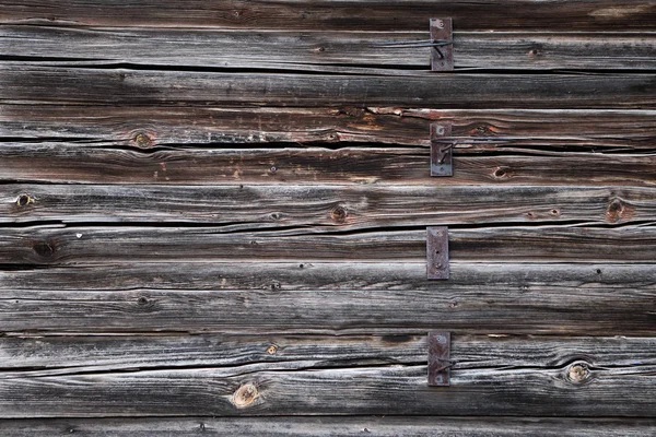 Belo, abstrato backgorund de madeira velha com partes de metal enferrujado . — Fotografia de Stock
