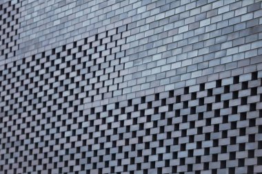 Sokaktaki gri soyut mimari duvar dokusu.