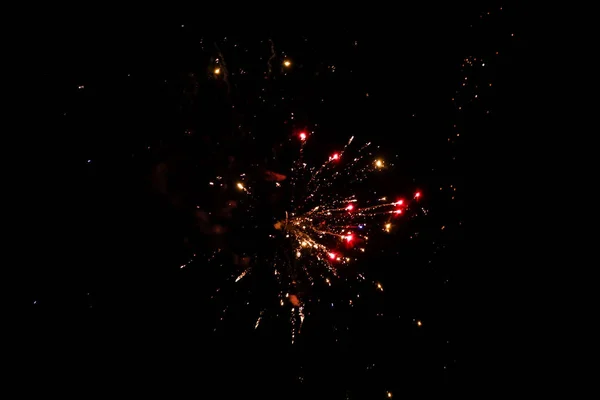 Beautiful new years firework celebration in black evening sky. — 스톡 사진