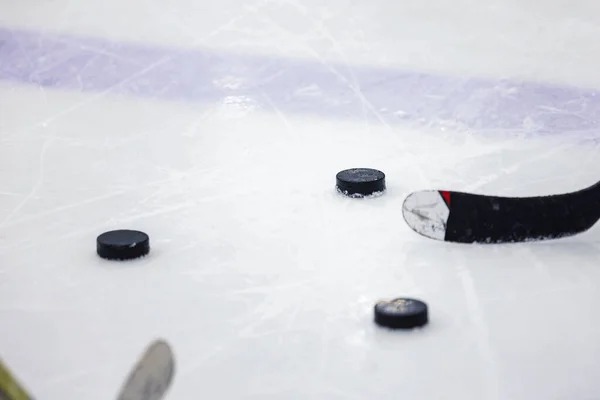 Three Ice Hockey Pucks Ice Arena Rink Two Hockey Sticks — Stock Photo, Image