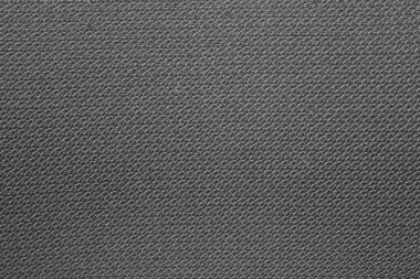 Gri çuval bezi arka planı. Eskimiş kumaş dokusuna boyanmış koyu renk. Boşluğu kopyala, metin için boş yer