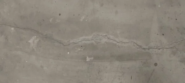 Arka planda çatlak olan beton duvar