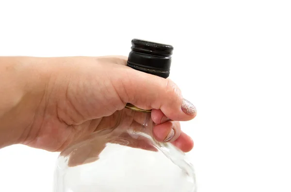Del Flaskan Kvinnlig Hand Vit Bakgrund Begreppet Kvinnlig Alkoholism Närbild — Stockfoto