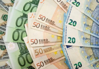 Güzelce katlanmış dolar ve euro banknotları. Para arkaplanı.