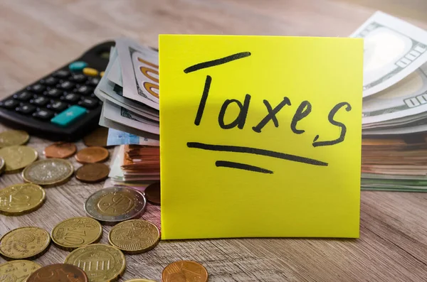 Taxes Inscription Sur Fond Une Pile Dollars Des Pièces Une — Photo