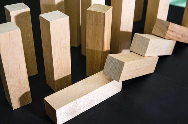 Falling Wooden Blocks Black Background Close Crisis Failure Business Insurance — Stock Photo, Image