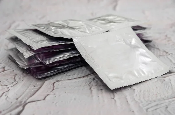 Lot Condoms Light Background Close — Stock Photo, Image