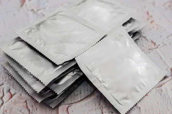 Lot Condoms Light Background Close — Stock Photo, Image
