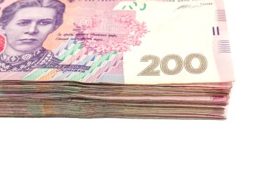 200 Hryvnia 'lı yığın beyaz arka planda izole edilmiş. Yakın plan. Bir sürü Ukrayna parası....