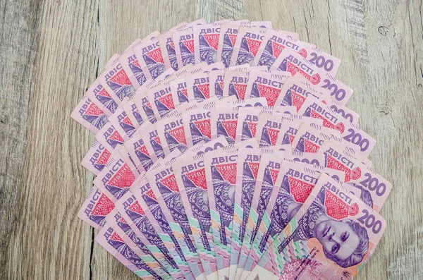 Lot Banknotes Face Value 200 Hryvnia Wooden Background Lot Ukrainian — Stock Photo, Image