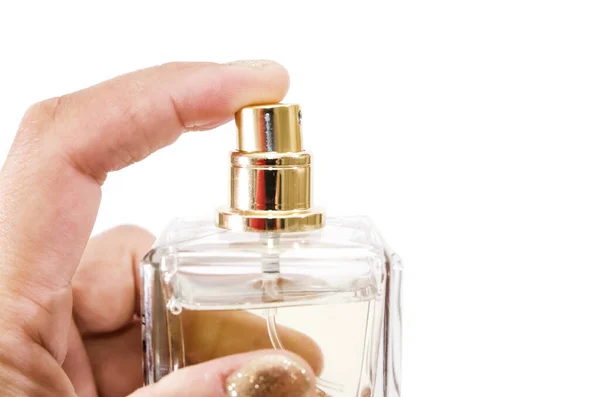女性的手拿着或者给了一罐香水水 因白人背景而被隔离 — 图库照片