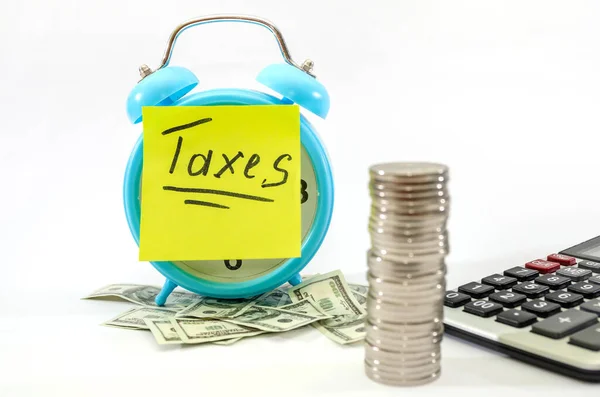 Word Taxes Sticker Money Alarm Clock White Background Tax Concept — Stock Photo, Image