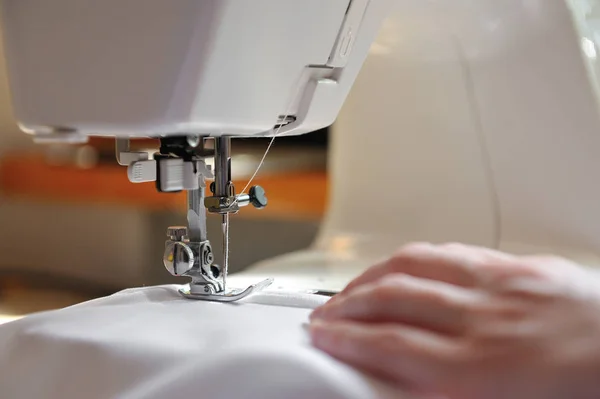 Sewing machine and fabric prepared for sewing — Stock Photo, Image