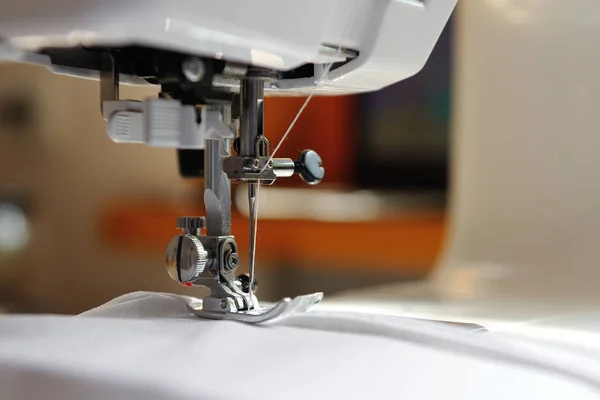 Sewing machine and fabric prepared for sewing — Stock Photo, Image