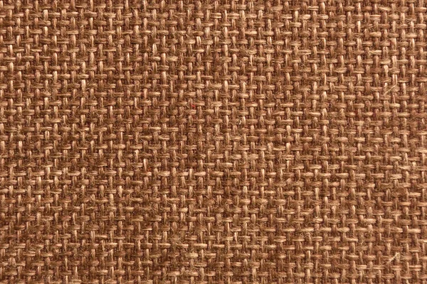 Une grande texture de la surface du tissu de toile est brune. Gros plan — Photo