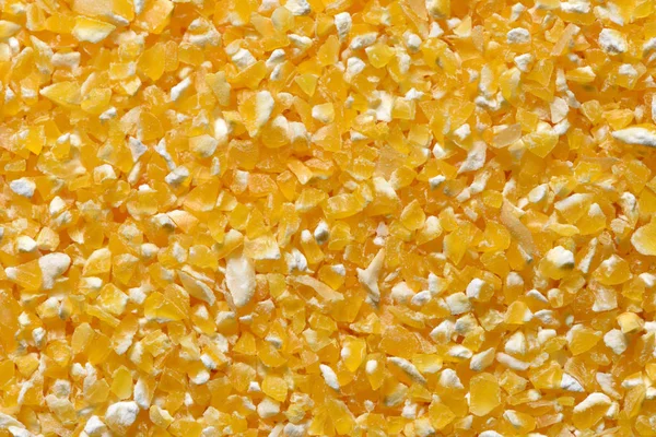 Żółta kasza kukurydziana z bliska. Kasza kukurydziana surowa na śniadanie owsianka — Zdjęcie stockowe