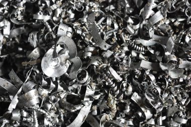 Değirmen makinesinde veya Cnc makinesinde çalıştıktan sonra metal talaşı yığını.