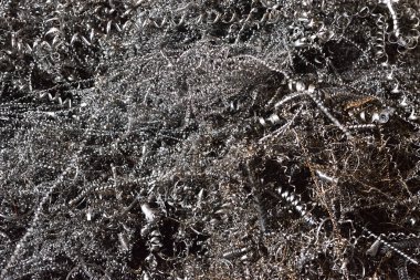 Değirmen makinesinde veya Cnc makinesinde çalıştıktan sonra metal talaşı yığını.