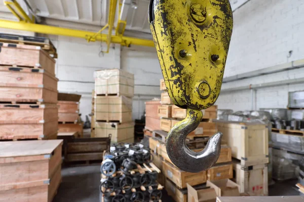 Lifting mechanism for lifting heavy loads in warehouse. Big Hook.