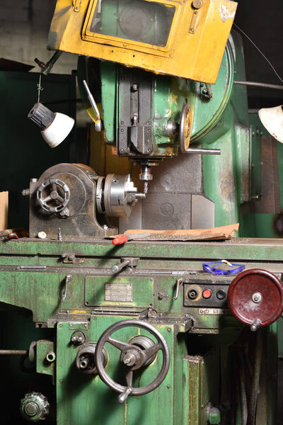 Spindle chuck and installed metal part in processing on high precision Cnc industrial lathe turning machine 