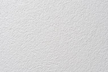 Doku, evin beyaz desenli duvarı, büyük bir tahılla. Şablon