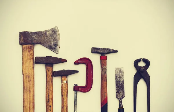 stock image Set of vintage hand construction tools on a white wooden backgro