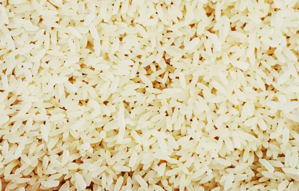 유기농 흰색긴 쌀밥의 근접 감촉. — 스톡 사진