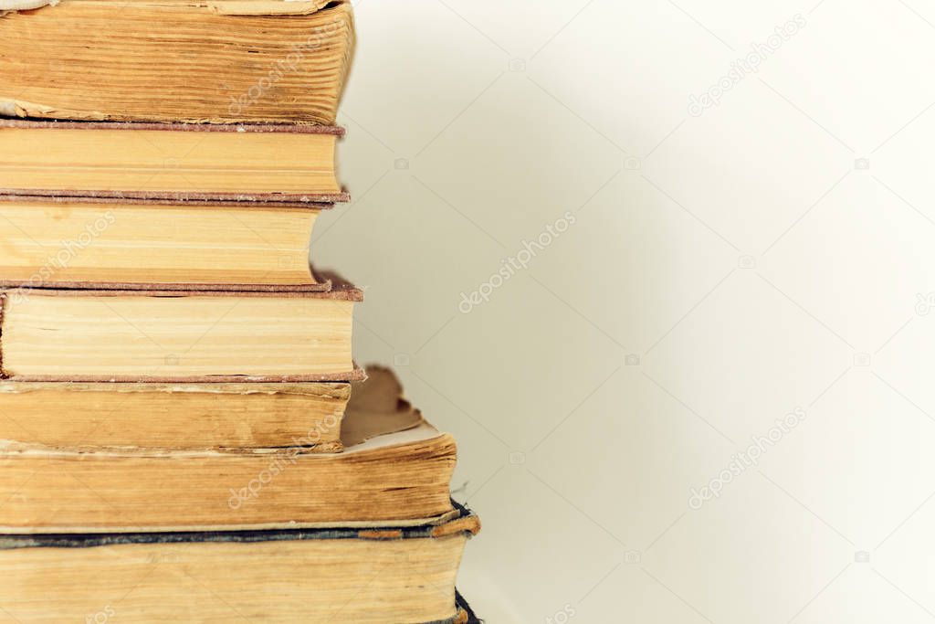 Stack of old books education retro concept background, many book