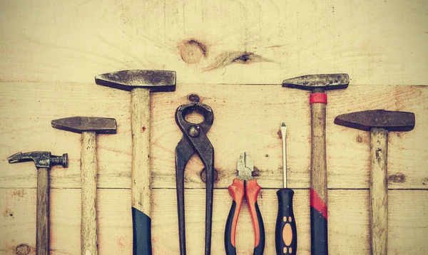 Set of old vintage hand construction tools on a wooden backgroun — Stock Photo, Image