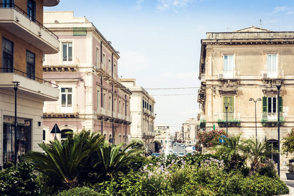 Ancient street with old houses on Ortygia Island, Syracuse (Sira