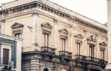 balcony in old baroque building in Catania, traditional architec