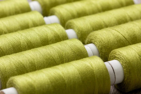Green spools of thread — Stock Photo, Image