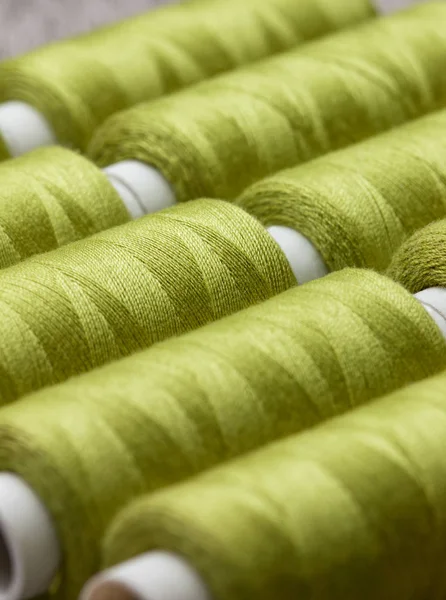 Green spools of thread — Stock Photo, Image