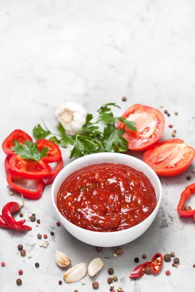 Tomato sauce in a white bowl — Stock Photo, Image