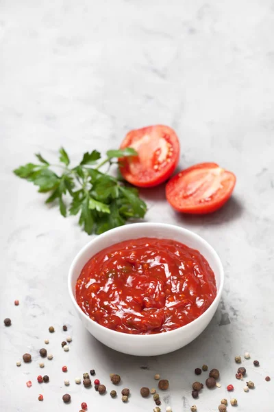 Tomato sauce in a white bowl — Stock Photo, Image