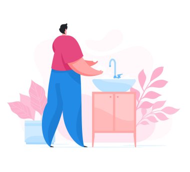 Adam ellerini yıkıyor ve lavabonun üzerindeki mikropları temizliyor.