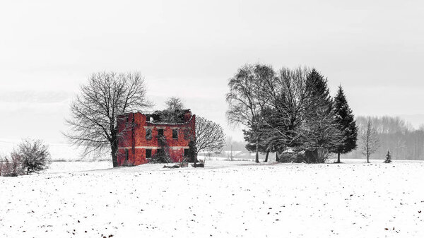 snow covering an abandoned farm