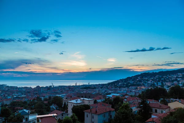 Sunset on the city of Trieste — Stock Photo, Image