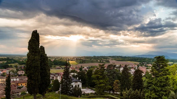 Evening storm over the medieval village — Stock Photo, Image