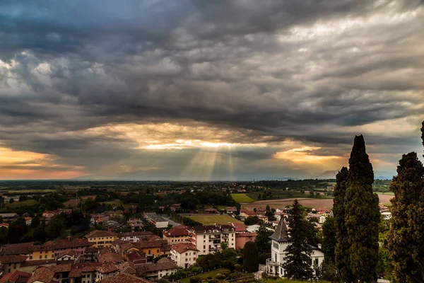 Evening storm over the medieval village — Stock Photo, Image