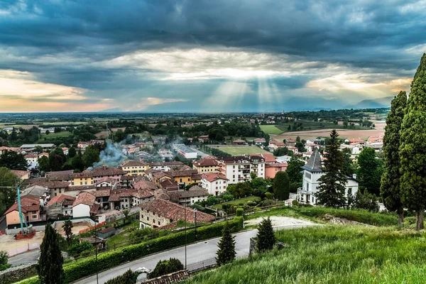 Evening storm over the medieval village — Stock Photo, Image