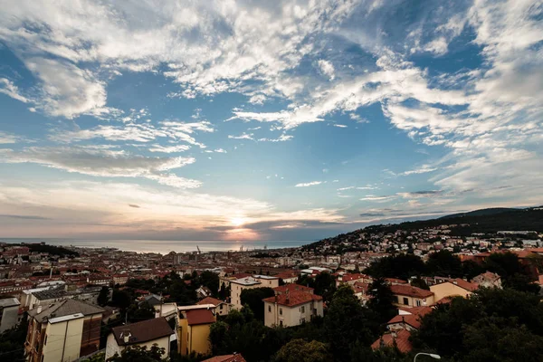 Sunset on the city of Trieste — Stock Photo, Image