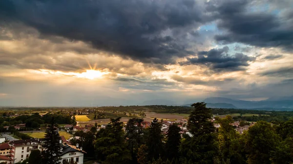 Evening storm over the medieval village — Stock Photo, Image