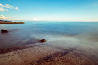 Denizde, Trieste günbatımı