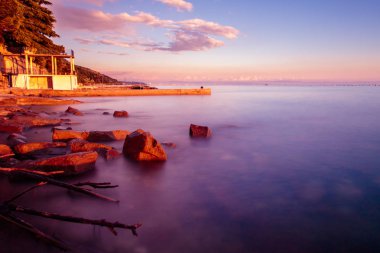 Denizde, Trieste günbatımı