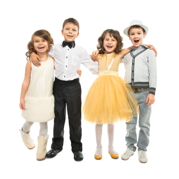 Grupp av glada barn i festliga kläder. — Stockfoto