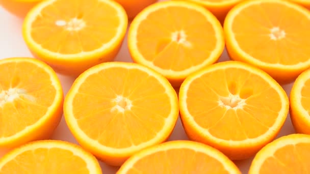 Closeup of sliced oranges — Stock Video