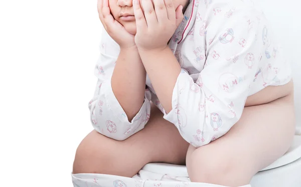 Fat boy sitting on the toilet — Stock Image Fat boy sitting on the toilet Royalty Free Stock Images